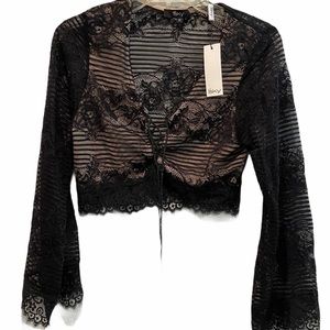 Sky black lace bell sleeve top. Lined. NWT